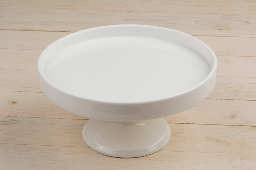 Empty white Plate on the wood