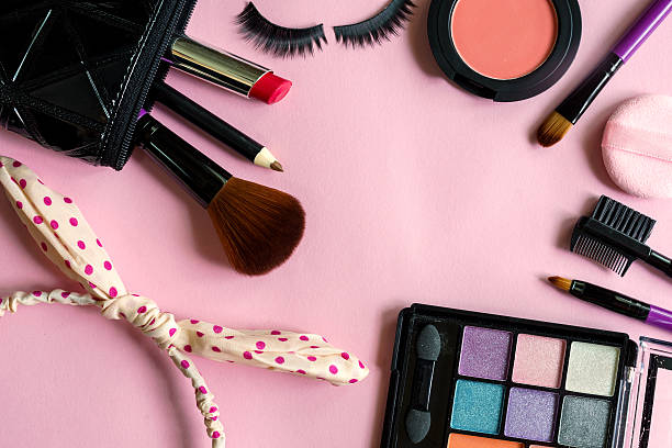istock various makeup products and cosmetics isolated on pink 583733616