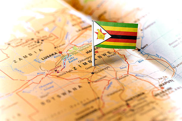 istock Zimbabwe pinned on the map with flag 583734106