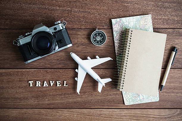 istock traveler planning trip on wooden background 583734456