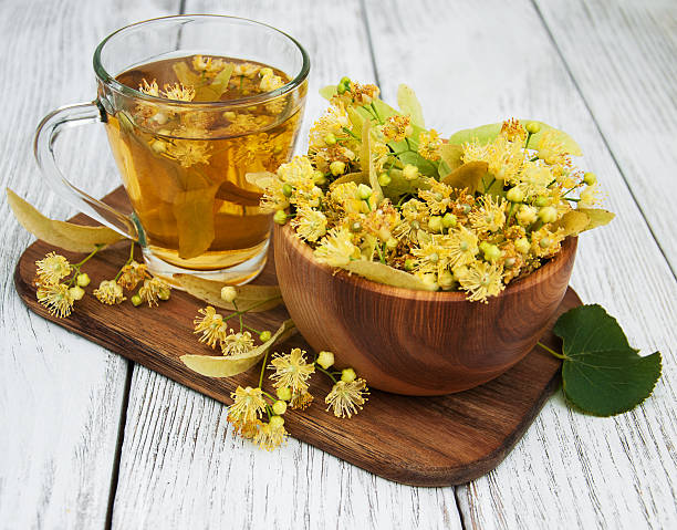 istock cup of herbal tea with linden flowers 583735096