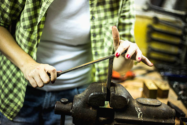istock Carpenter women working in her workshop 583735282