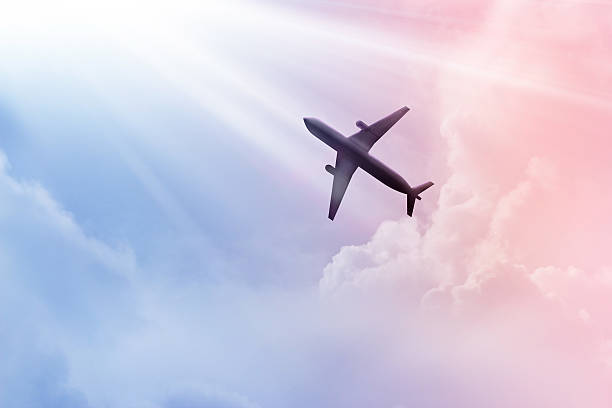 istock Airplane in the sky and cloud colorful at sunset 583735558