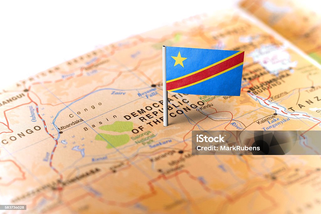 Democratic Republic of Congo pinned on the map with flag The flag of Democratic Republic of Congo pinned on the map. Horizontal orientation. Macro photography. Democratic Republic of the Congo Stock Photo