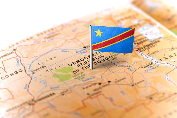 Democratic Republic of Congo pinned on the map with flag The flag of Democratic Republic of Congo pinned on the map. Horizontal orientation. Macro photography. democratic republic of the congo stock pictures, royalty-free photos & images