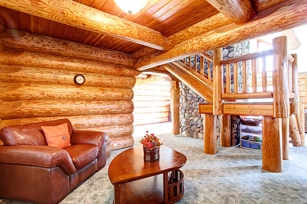 istock Large log cabin house interior - cozy Sitting room 583737126