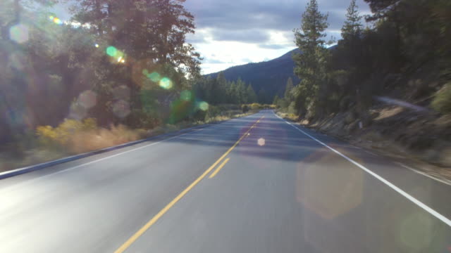 Driver’s POV on highway with oncoming traffic, California, USA, shot on R3D