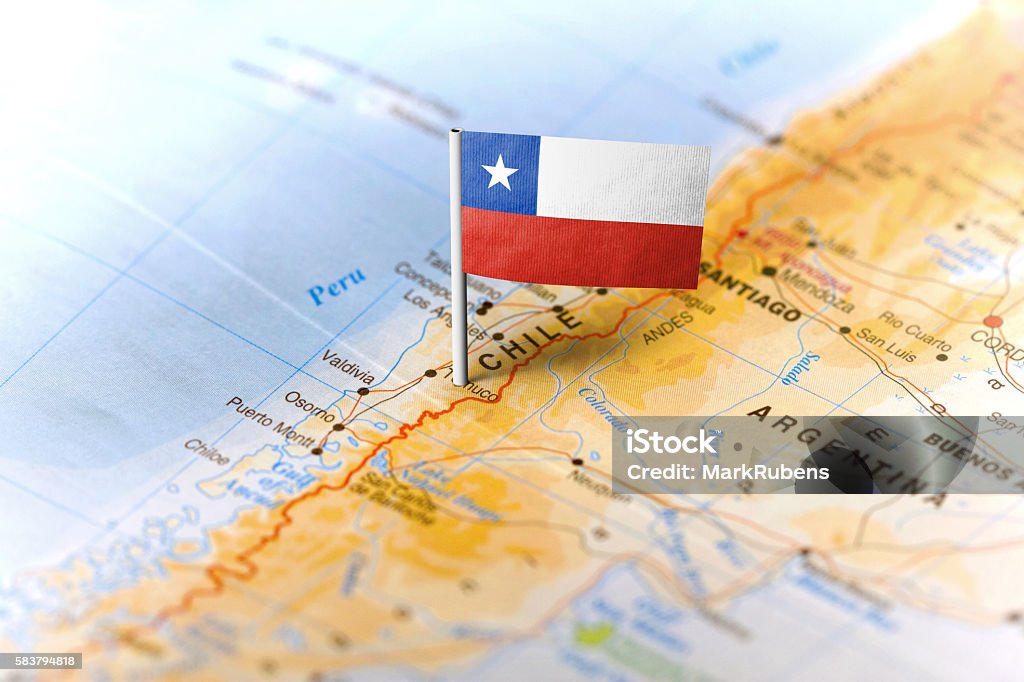 Chile pinned on the map with flag The flag of Chile pinned on the map. Horizontal orientation. Macro photography. Chile Stock Photo