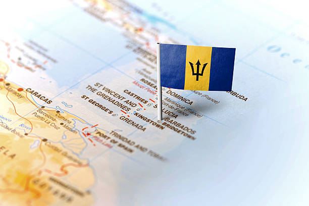 Barbados pinned on the map with flag The flag of Barbados pinned on the map. Horizontal orientation. Macro photography. barbados map stock pictures, royalty-free photos & images