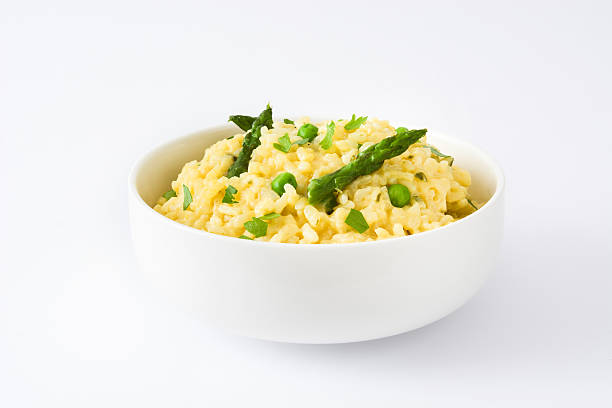 istock Risotto with asparagus and peas 583795236