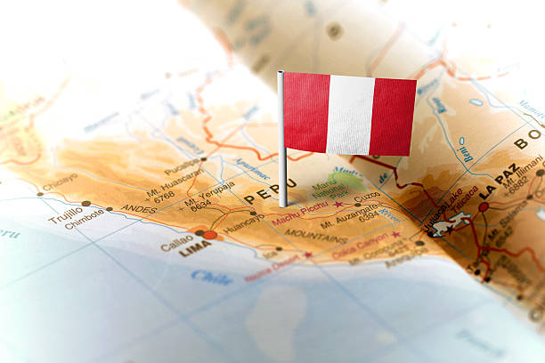 Peru pinned on the map with flag The flag of Peru pinned on the map. Horizontal orientation. Macro photography. peru photos stock pictures, royalty-free photos & images
