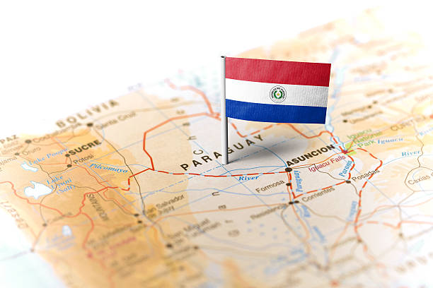 Paraguay pinned on the map with flag The flag of Paraguay pinned on the map. Horizontal orientation. Macro photography. paraguay stock pictures, royalty-free photos & images