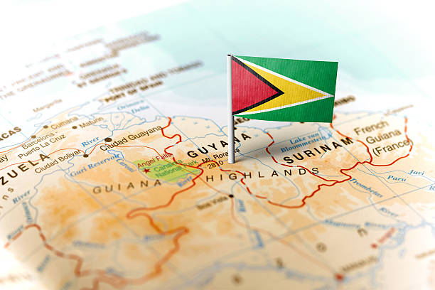 guyana clavada en el mapa con bandera - flag of guyana fotografías e imágenes de stock