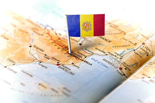 Andorra pinned on the map with flag The flag of Andorra pinned on the map. Horizontal orientation. Macro photography. andorra photos stock pictures, royalty-free photos & images