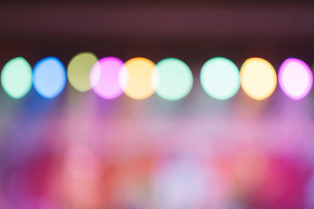 istock Blurred background : Bokeh lighting in concert with audience. 583797822