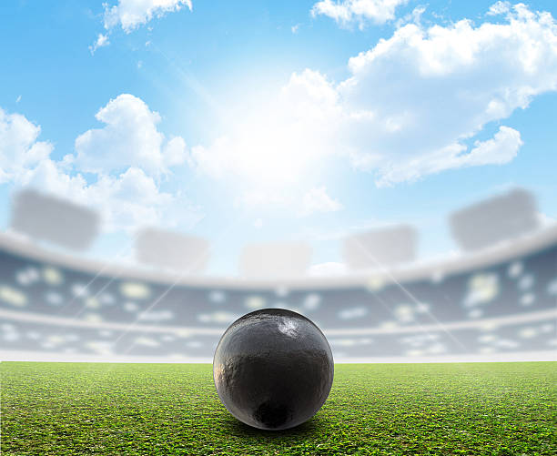 istock Shotput Ball Stadium And Green Turf 583798280
