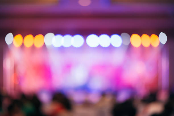 istock Blurred background : Bokeh lighting in concert with audience. 583798818