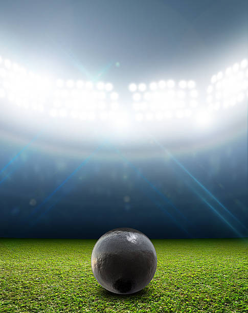 istock Shotput Ball In Generic Floodlit Stadium 583799050