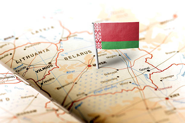 Belarus pinned on the map with flag The flag of Belarus pinned on the map. Horizontal orientation. Macro photography. belarus stock pictures, royalty-free photos & images
