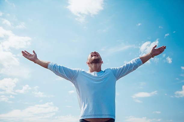 istock The man held out his hands to the sky. Freedom. 583800802