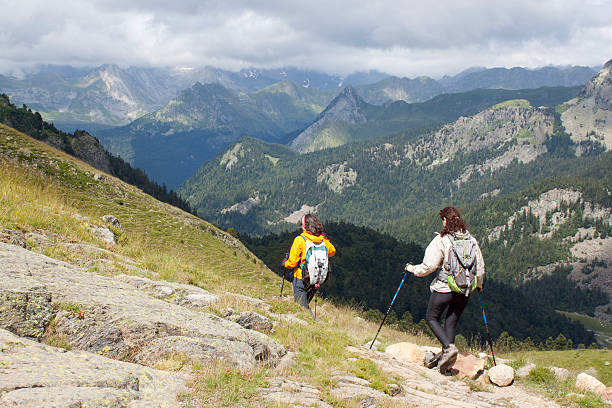 istock mountaineers going down the mountains in a excursion 583802340