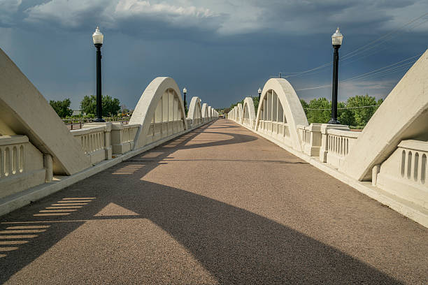 istock Concrete arch bridge over South Platte River 583802710