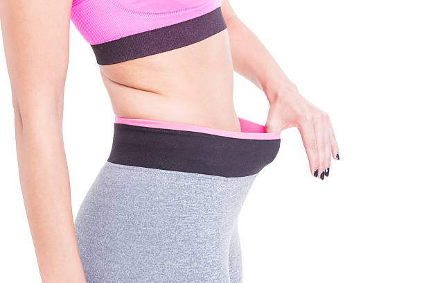 istock Woman holding her tights as smiling concept 583805504