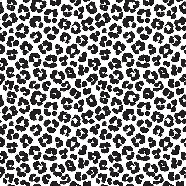 Leopard print seamless background pattern. Black and white vector art illustration