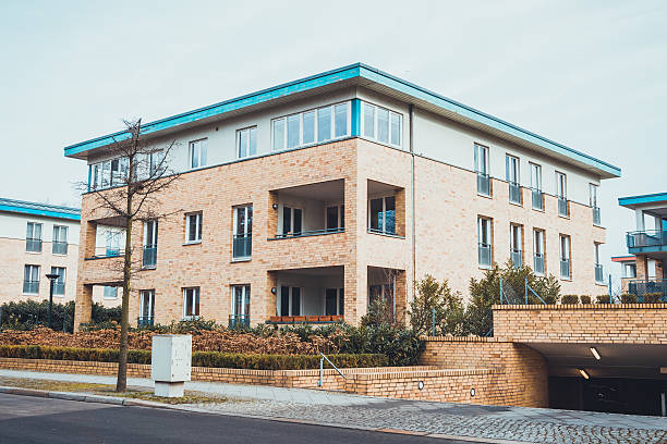 istock Empty street in front of modern bi level housing 583809000