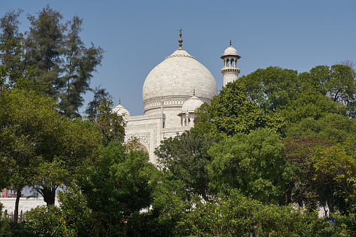 The Taj Mahal is an ivory-white marble mausoleum on the south bank of the Yamuna river in the Indian city of