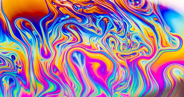 Photo of Rainbow colors created by soap, bubble,or oil