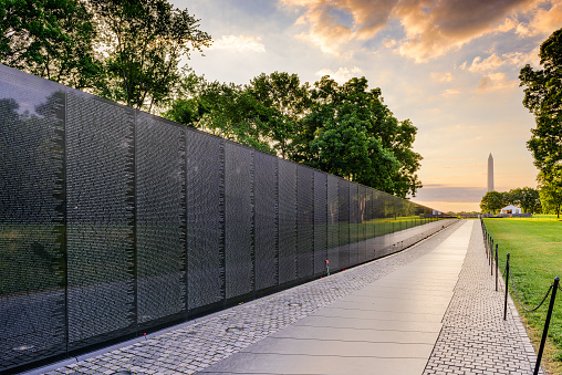 Washington DC, USA - June 18, 2016: The Memorial Wall of the Vietnam Veterans Memorial in Washington DC at dawn.