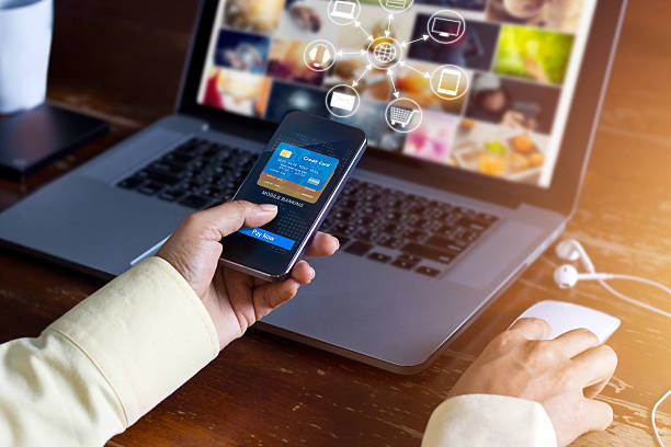 istock Man using mobile payments online shopping and icon customer network 583815090