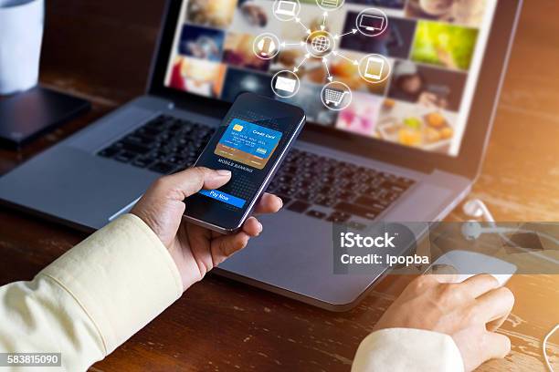 Man Using Mobile Payments Online Shopping And Icon Customer Network Stock Photo - Download Image Now