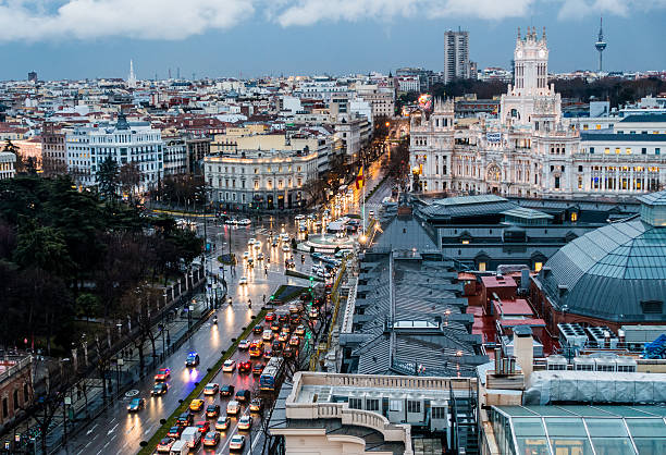 istock gran via madrid town hall cibeles dusk rain colour horizontal 583818308