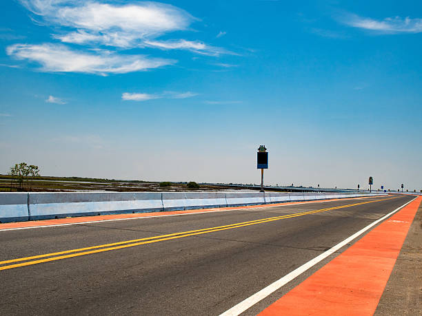 istock Road. Asphalt road with clouds blue sky in summer day 583820780