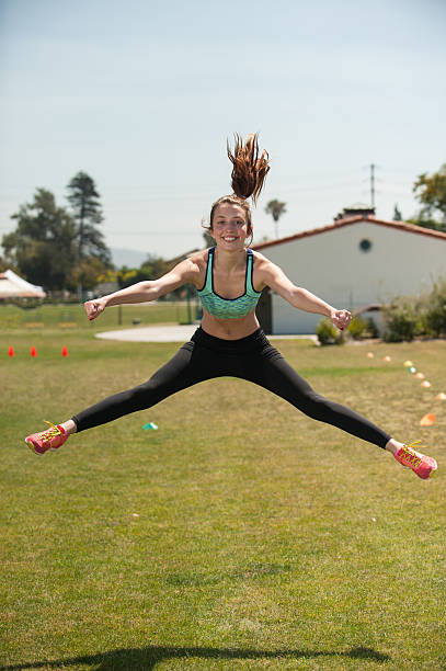 istock Agile teenager showing her flexibility 583824912