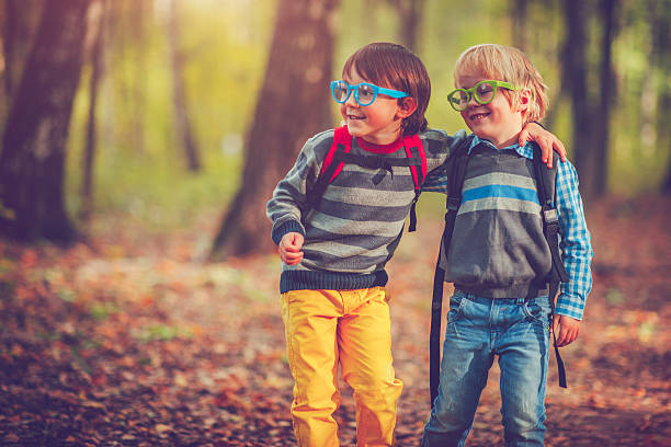 Schoolboys in autumn