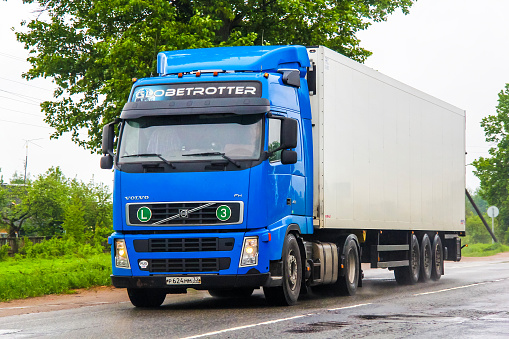 Moscow region, Russia - May 22, 2013: Semi-trailer truck Volvo FH12 drives at the interurban road.