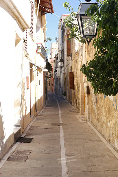 istock narrow alley in Greece 583828458