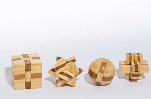 Four Complex Wooden Puzzle