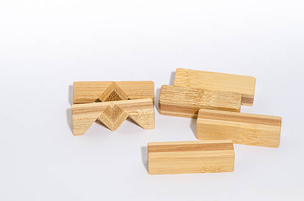 istock Six Pieces Wooden Puzzle Disassembled 583830302
