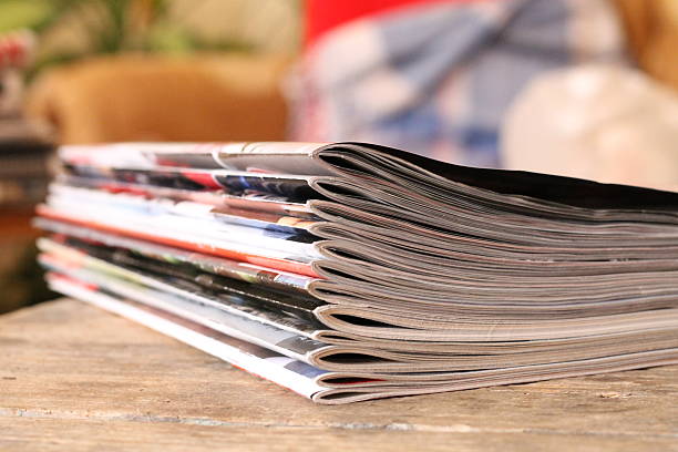 istock Magazines on the wooden table 583831390
