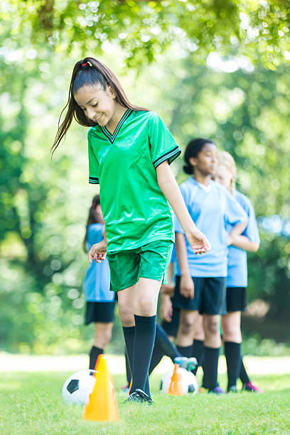 istock Pretty girl warming up before her soccer game 583831682