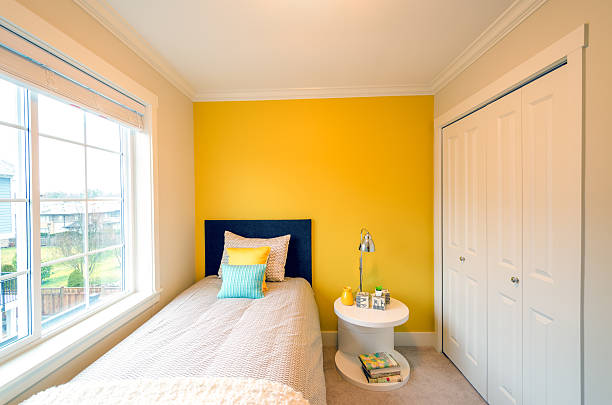 istock Modern yellow bedroom interior design. 583832684