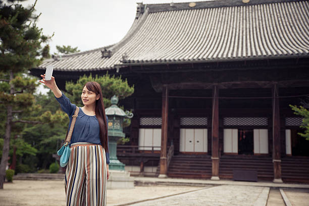 istock Tourist snaps a selfie 583835882