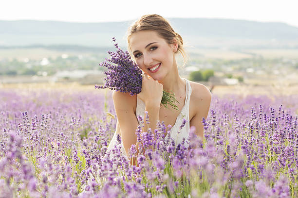 istock Happy girl in lavender field 583836392