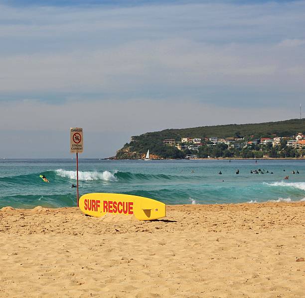 Surf rescue board is standing on sands at the beach.Phuket Island - Thailand.