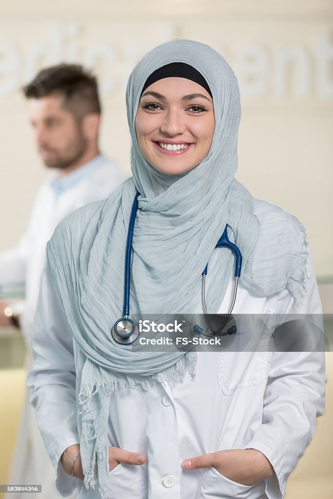 Closeup portrait of friendly, smiling confident muslim female doctor. Middle Eastern Ethnicity Stock Photo