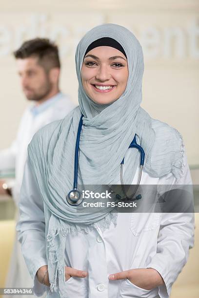 Closeup Portrait Of Friendly Smiling Confident Muslim Female Doctor Stock Photo - Download Image Now